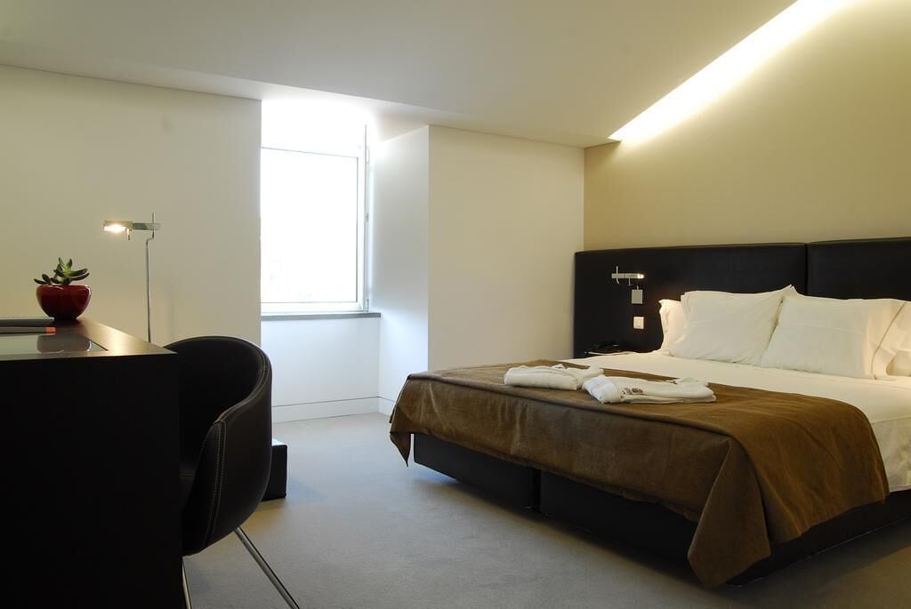 Hypoallergeen beddengoed, een minibar, een kluis op de kamer, een bureau