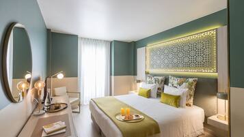Hypo-allergenic bedding, minibar, in-room safe, desk