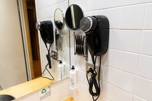 Eco-friendly toiletries, hair dryer, towels, soap