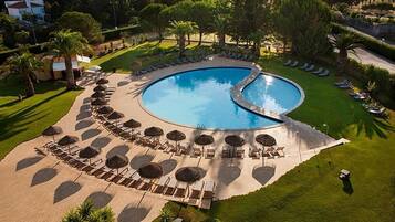 Indoor pool, outdoor pool, open 9:30 AM to 8 PM, pool loungers