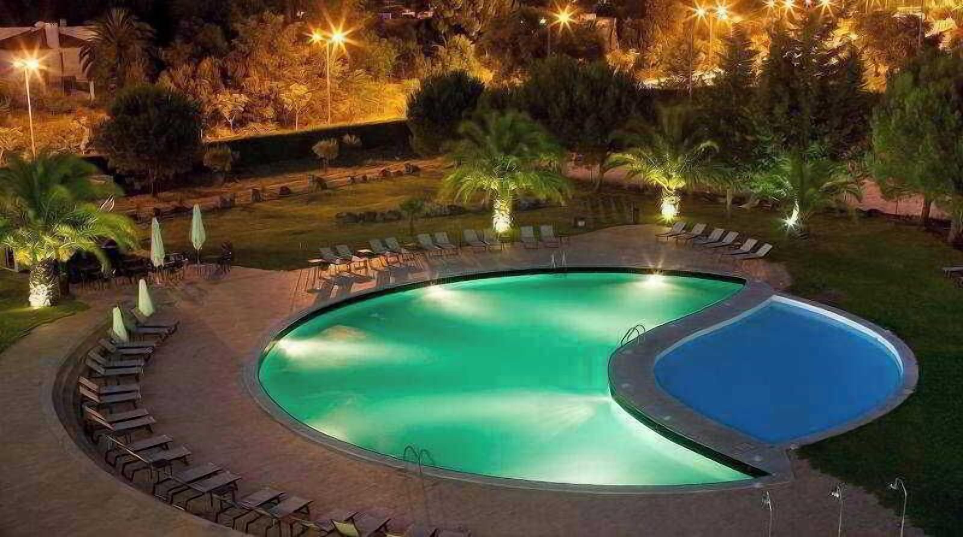 indoor pool, outdoor pool, open 9:30 am to 8 pm, pool loungers