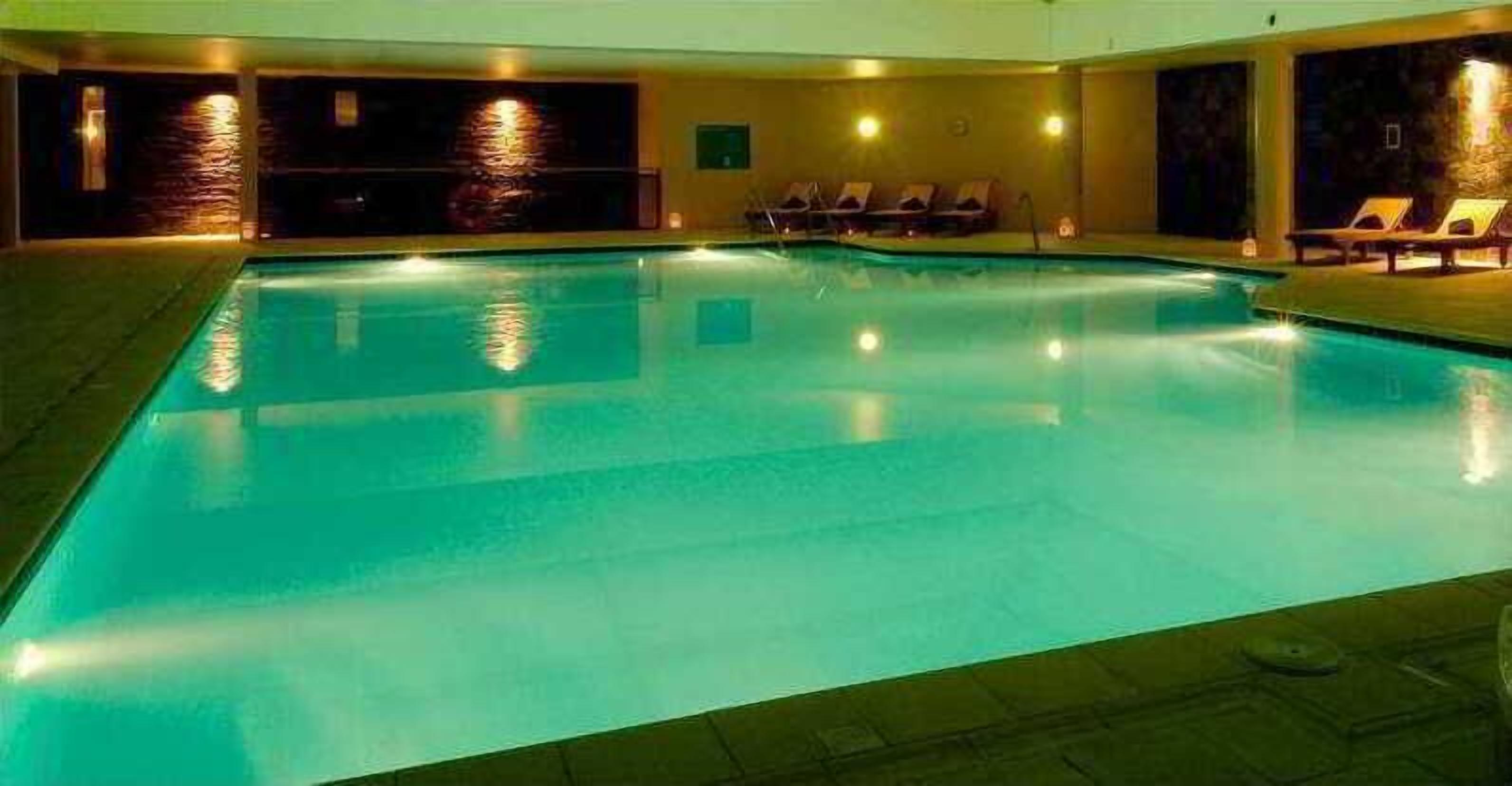 indoor pool, outdoor pool, open 9:30 am to 8 pm, pool loungers