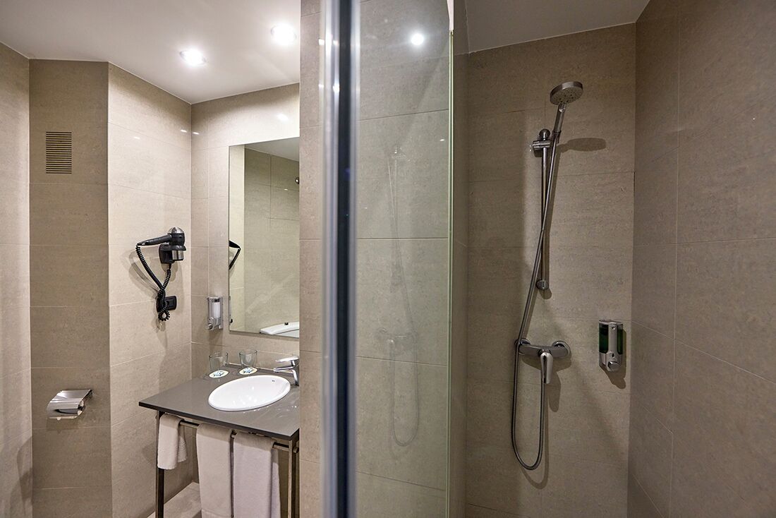 classic double room | bathroom | hair dryer, bidet, towels, soap