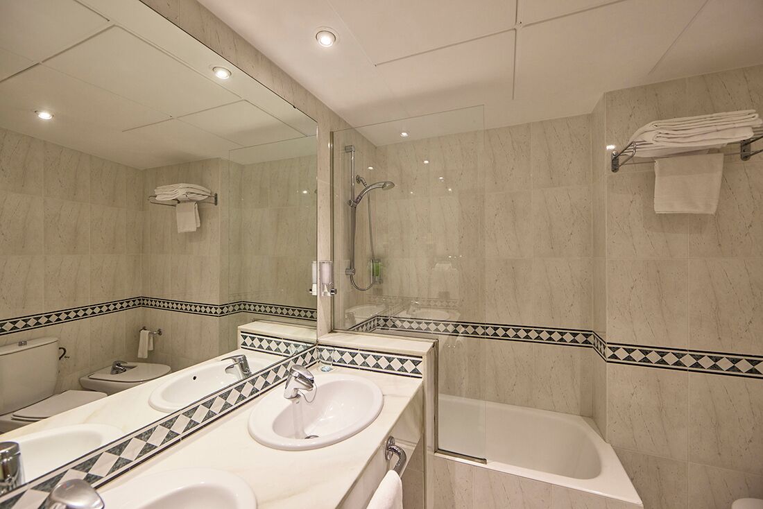 classic double room | bathroom | hair dryer, bidet, towels, soap