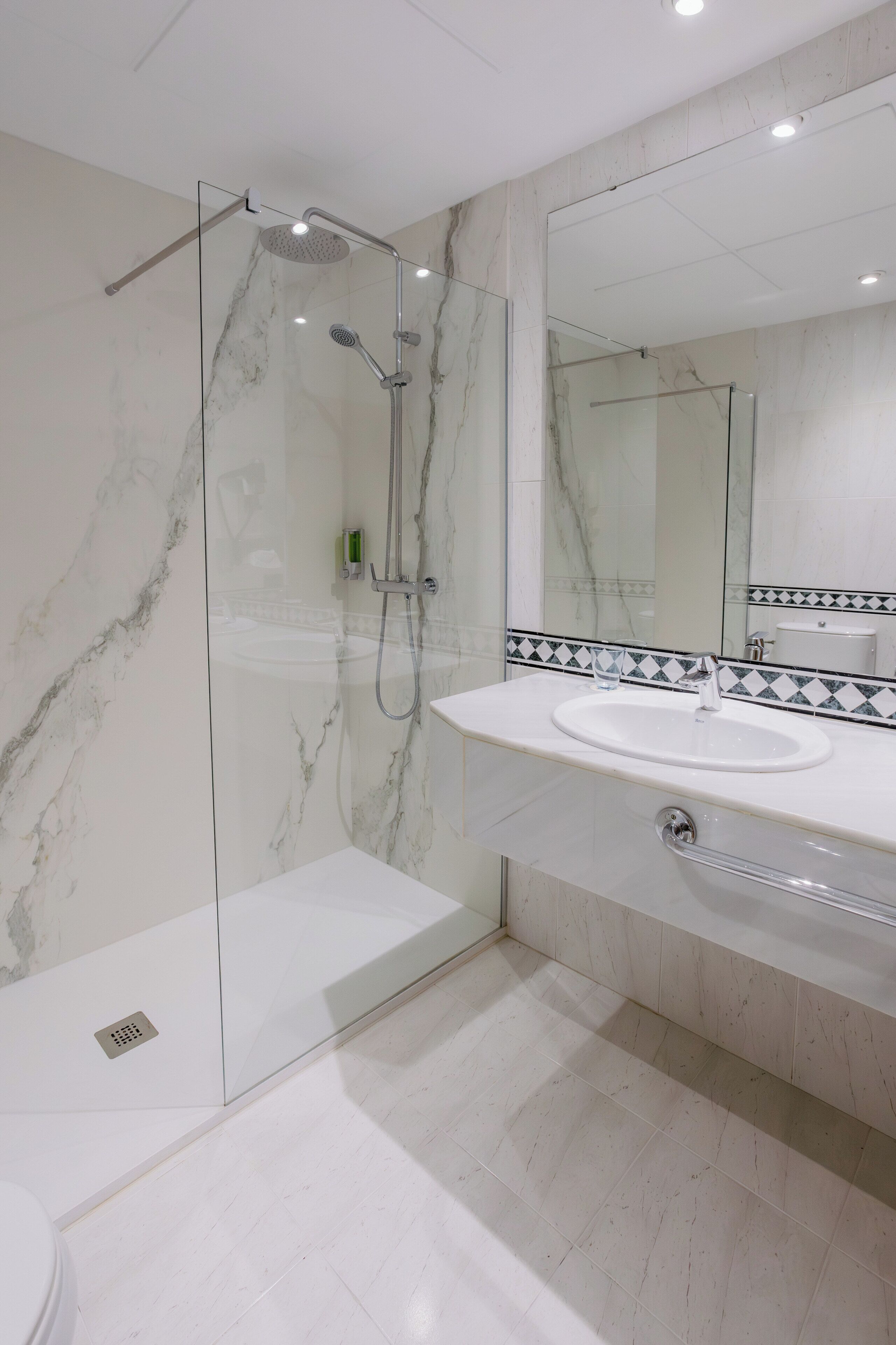 junior suite | bathroom | hair dryer, bidet, towels, soap