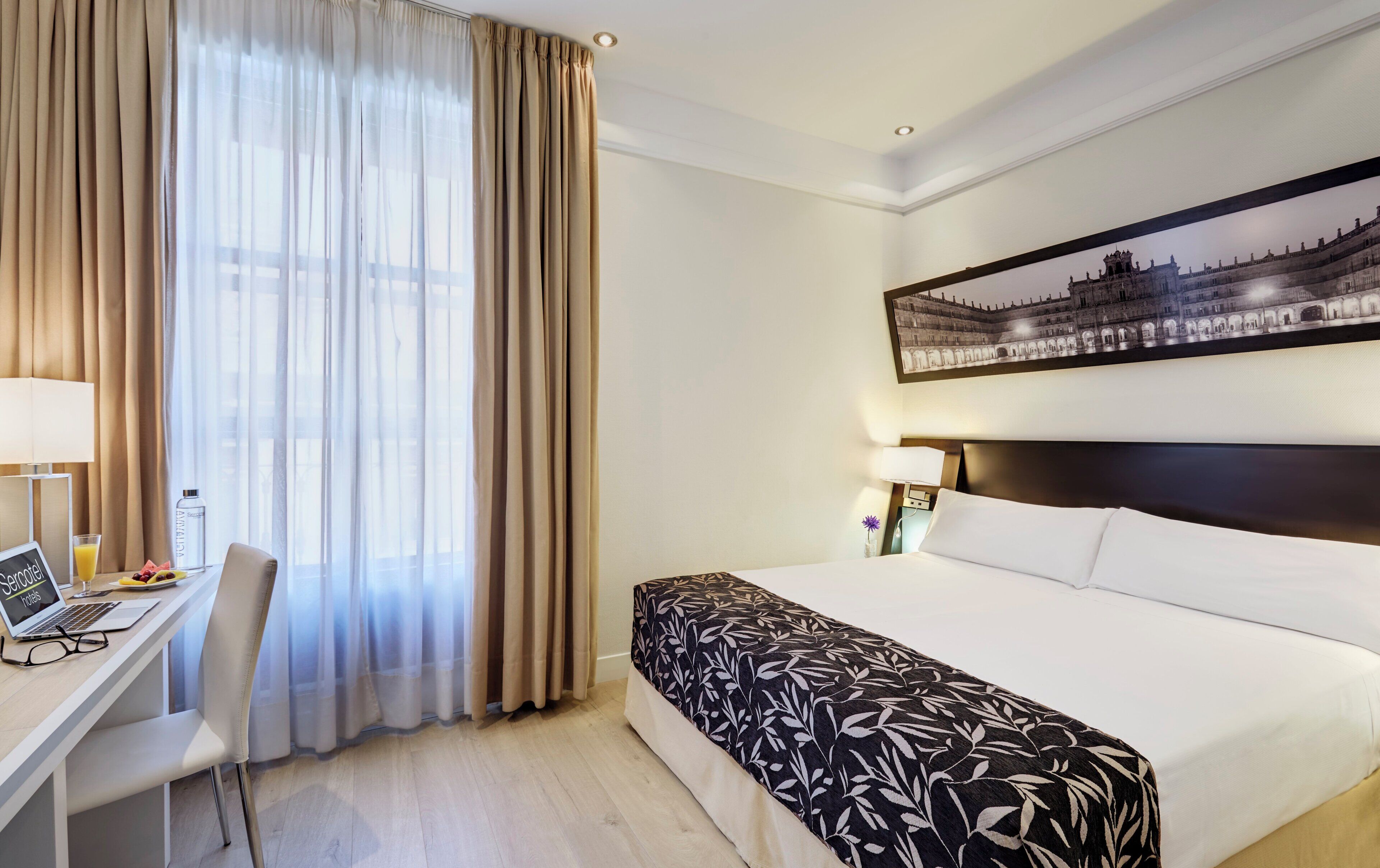 Classic Double Room | Minibar, in-room safe, desk, laptop workspace