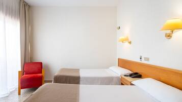 Desk, blackout drapes, WiFi (free), bed sheets