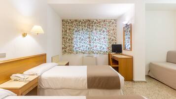 Desk, blackout drapes, WiFi (free), bed sheets