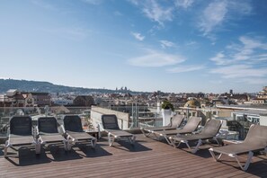 Outdoor pool, open 7:00 AM to 10:30 PM, pool umbrellas, pool loungers
