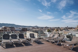 Outdoor pool, open 7:00 AM to 10:30 PM, pool umbrellas, pool loungers