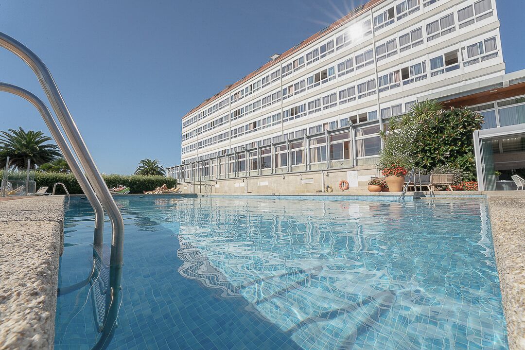 indoor pool, seasonal outdoor pool, pool umbrellas, pool loungers