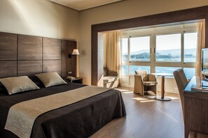 Roba de llit d'alta qualitat, minibar i caixa forta a l'habitació 