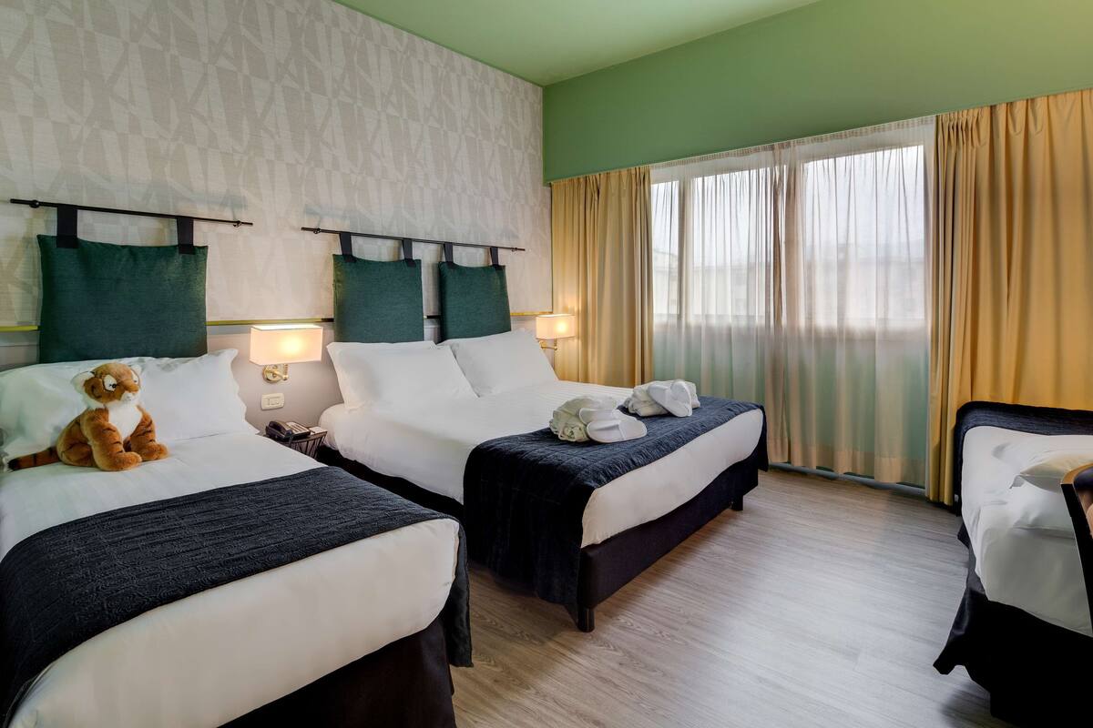 executive room, multiple beds | down duvets, minibar, in-room safe, desk