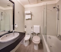 Combined shower/tub, free toiletries, hair dryer, bathrobes