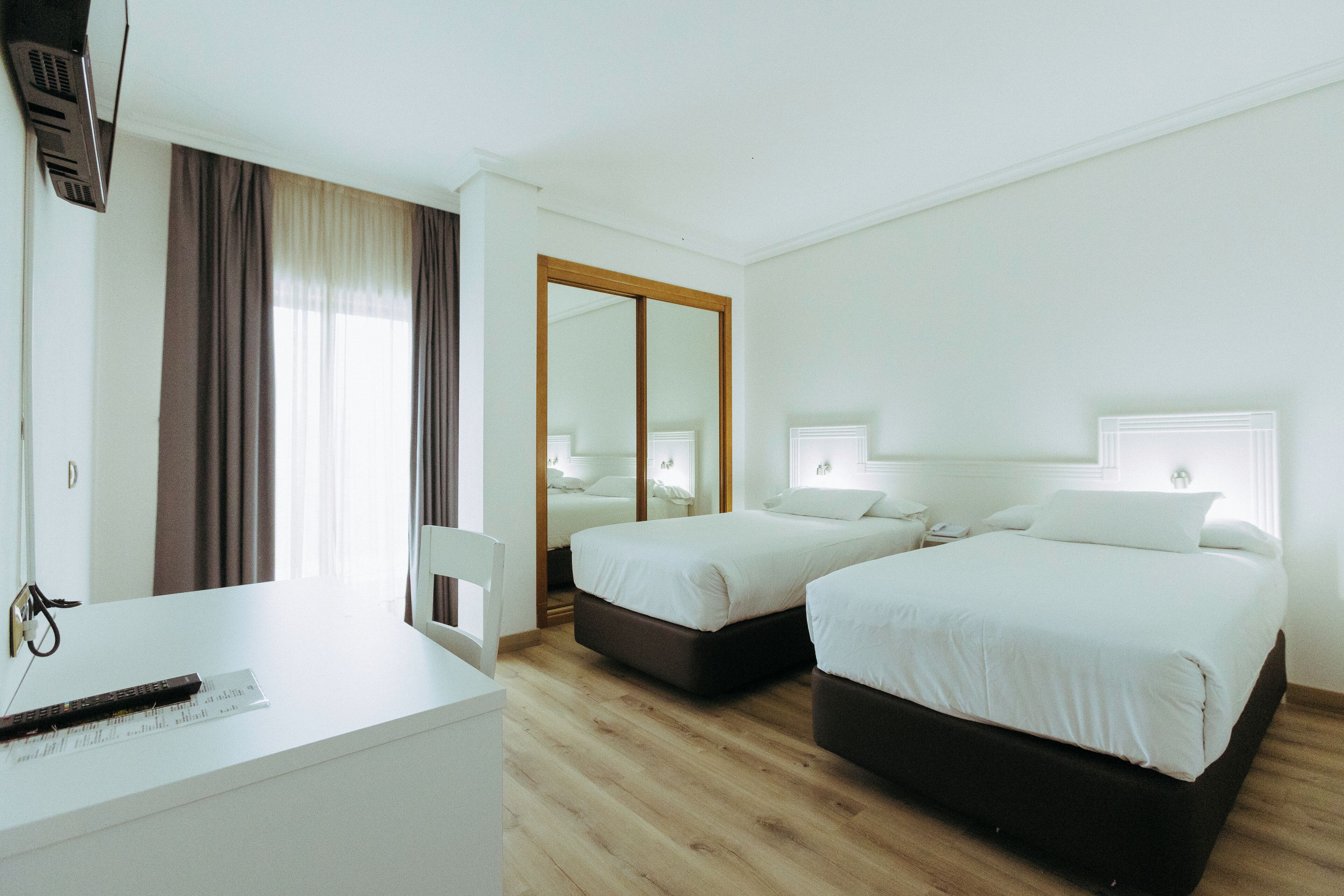 Double Room, Twin Beds | Down comforters, desk, laptop workspace, free WiFi