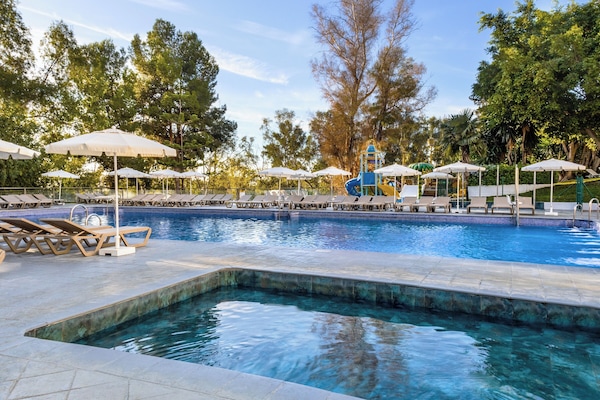 2 outdoor pools, pool umbrellas, sun loungers