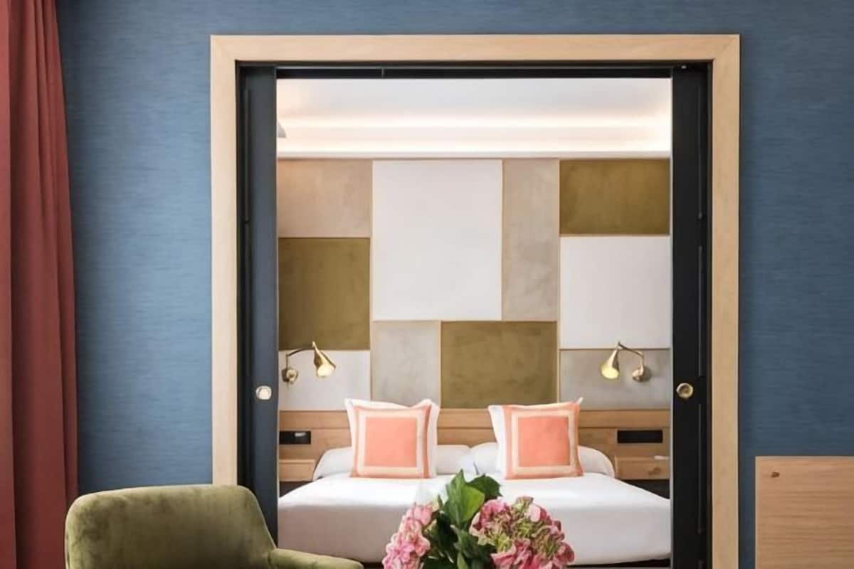 Minibar, in-room safe, individually decorated, desk