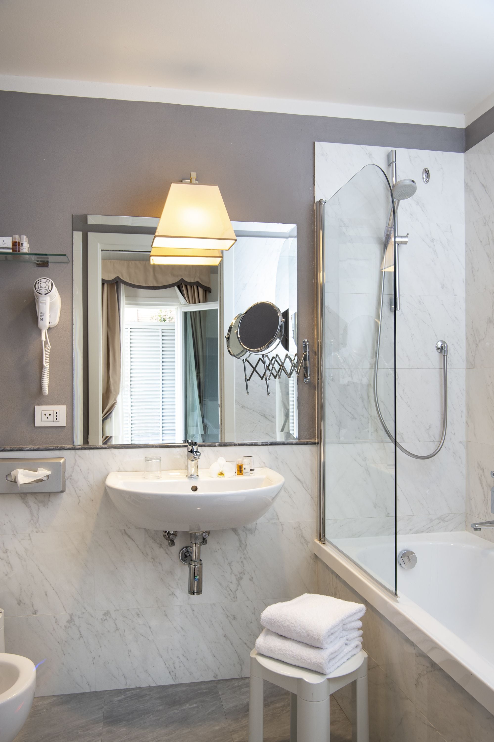 free toiletries, hair dryer, bidet, towels