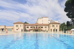 Seasonal outdoor pool, pool umbrellas, pool loungers