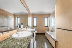 Eco-friendly toiletries, hair dryer, bidet, towels