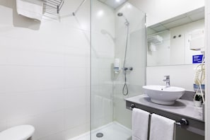 Shower, free toiletries, hair dryer, towels