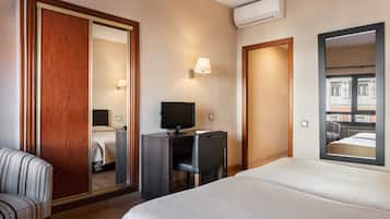 Desk, blackout curtains, free WiFi, bed sheets