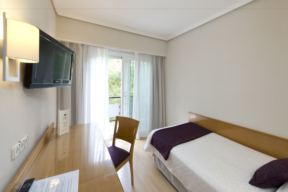 Habitación individual | Ropa de cama de alta calidad y edredón