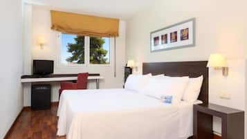 Down comforters, minibar, desk, laptop workspace