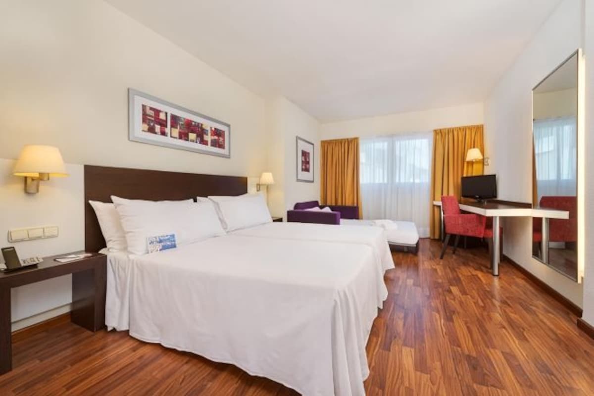 Triple Room (1 Adult + 1 Child)