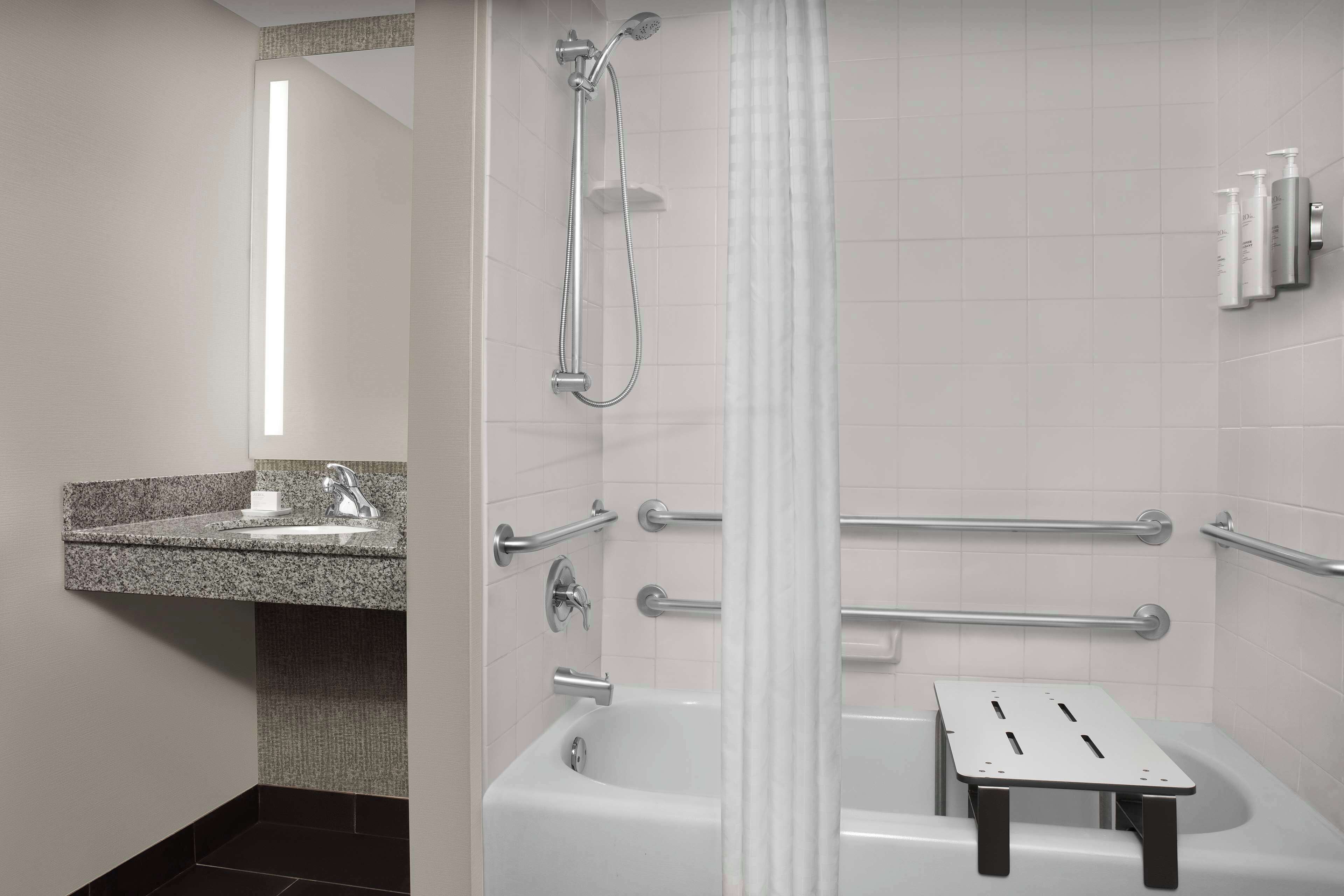 combined shower/bathtub, free toiletries, hair dryer, towels