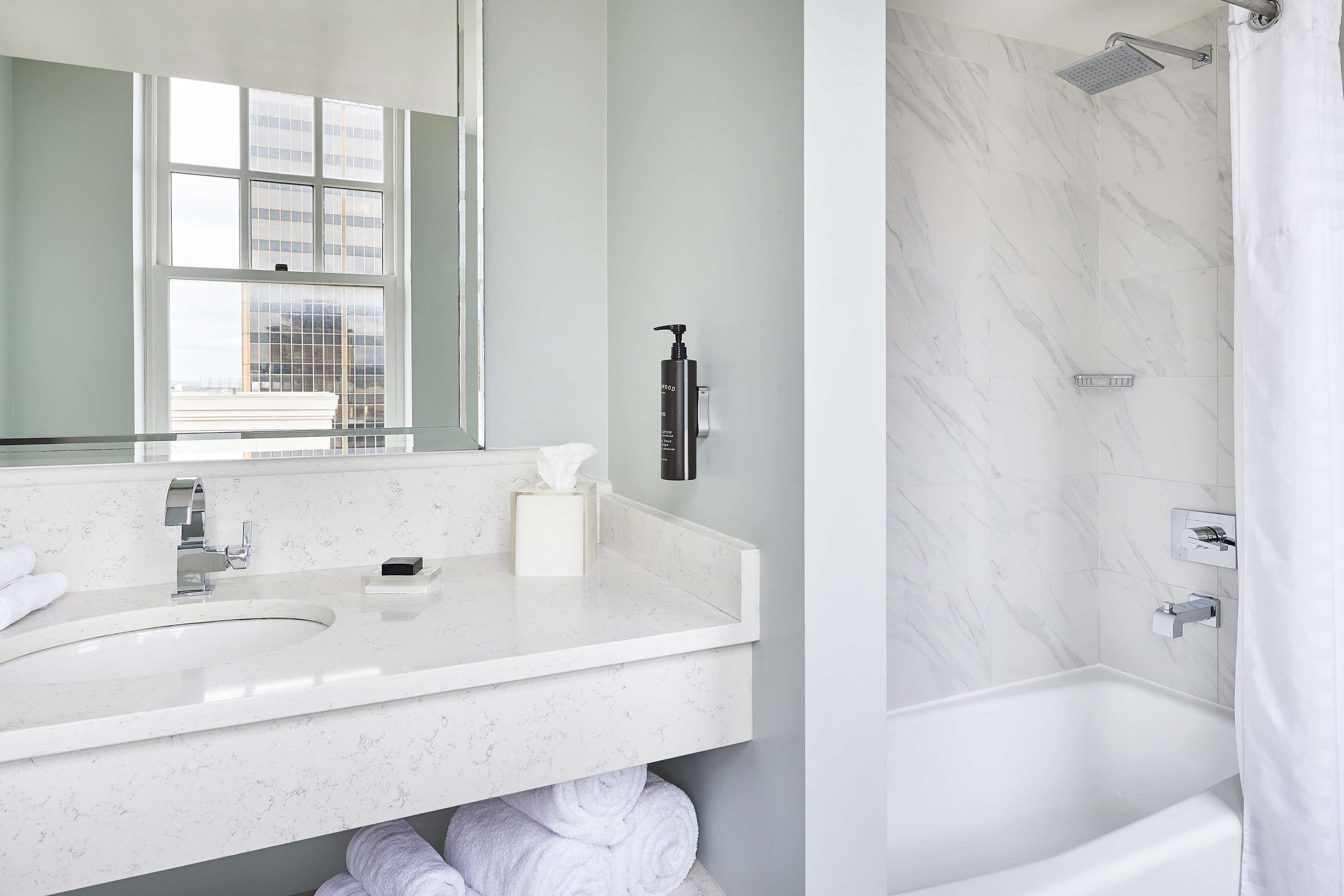 combined shower/bathtub, free toiletries, hair dryer, towels