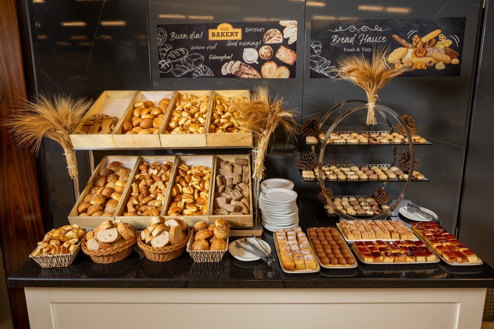 A bakery display with various baked goods and pastries.