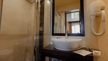 Hydromassage showerhead, free toiletries, hair dryer, slippers