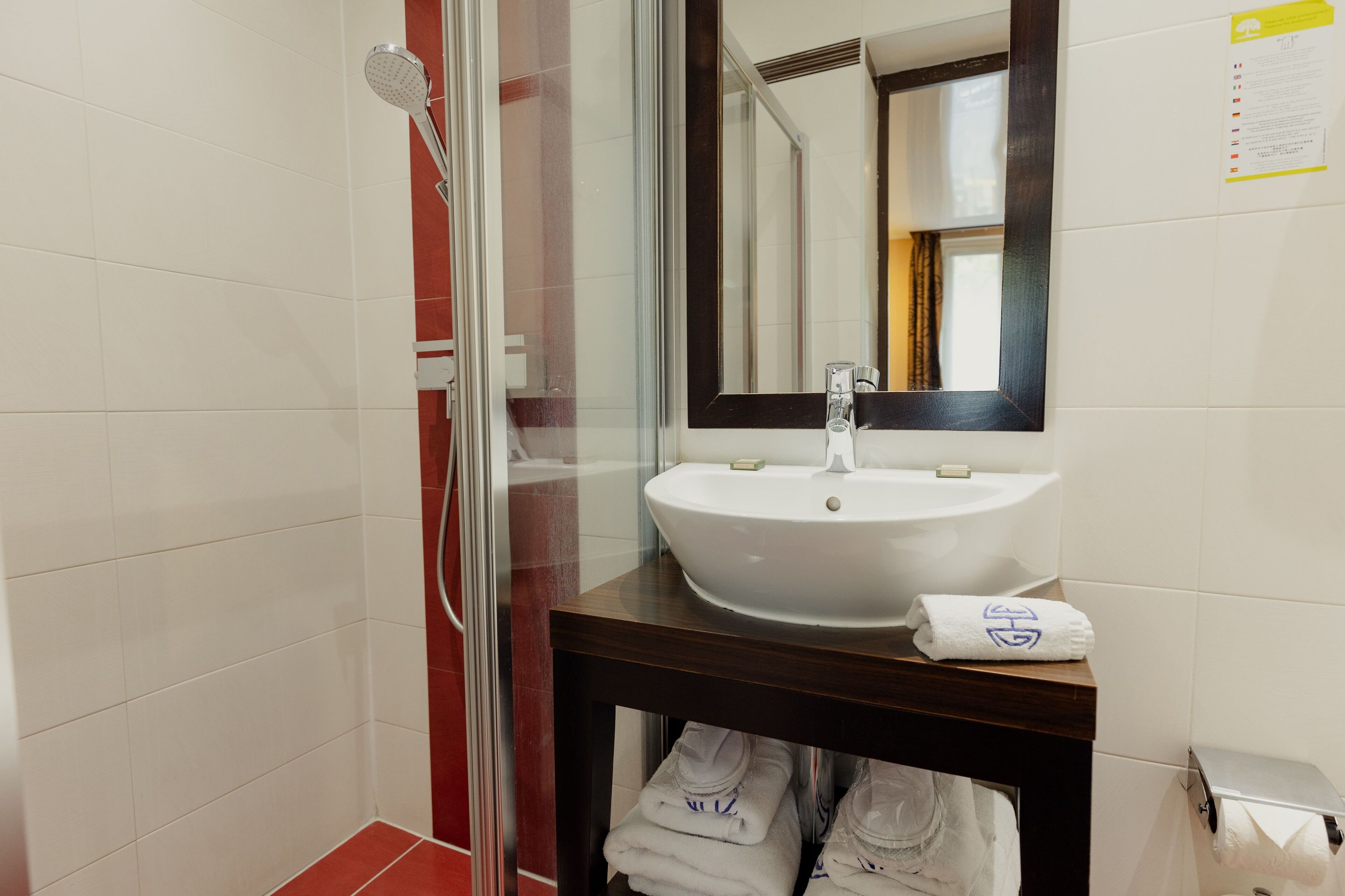 hydromassage showerhead, free toiletries, hair dryer, slippers