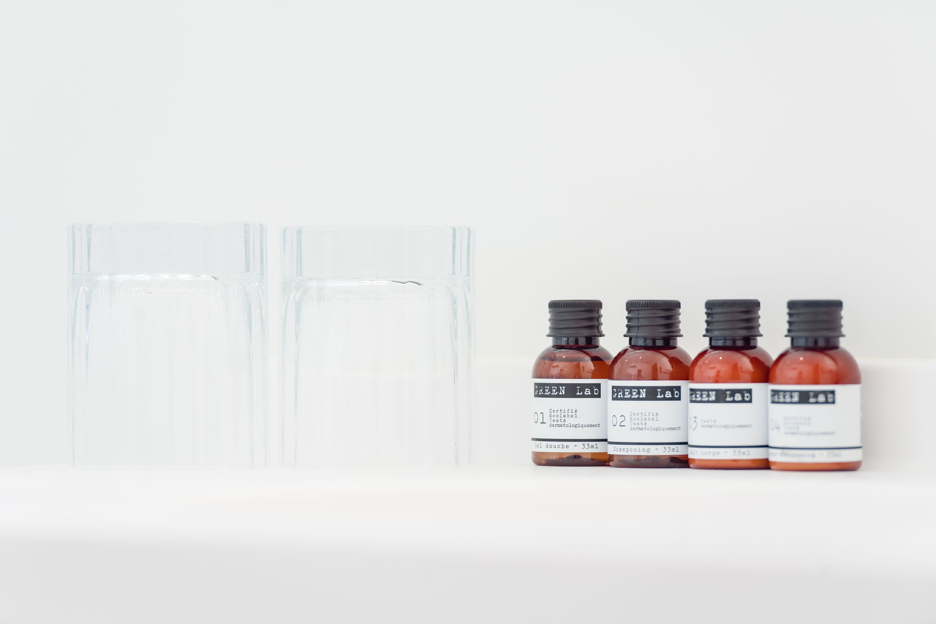 eco-friendly toiletries, hair dryer, towels, soap