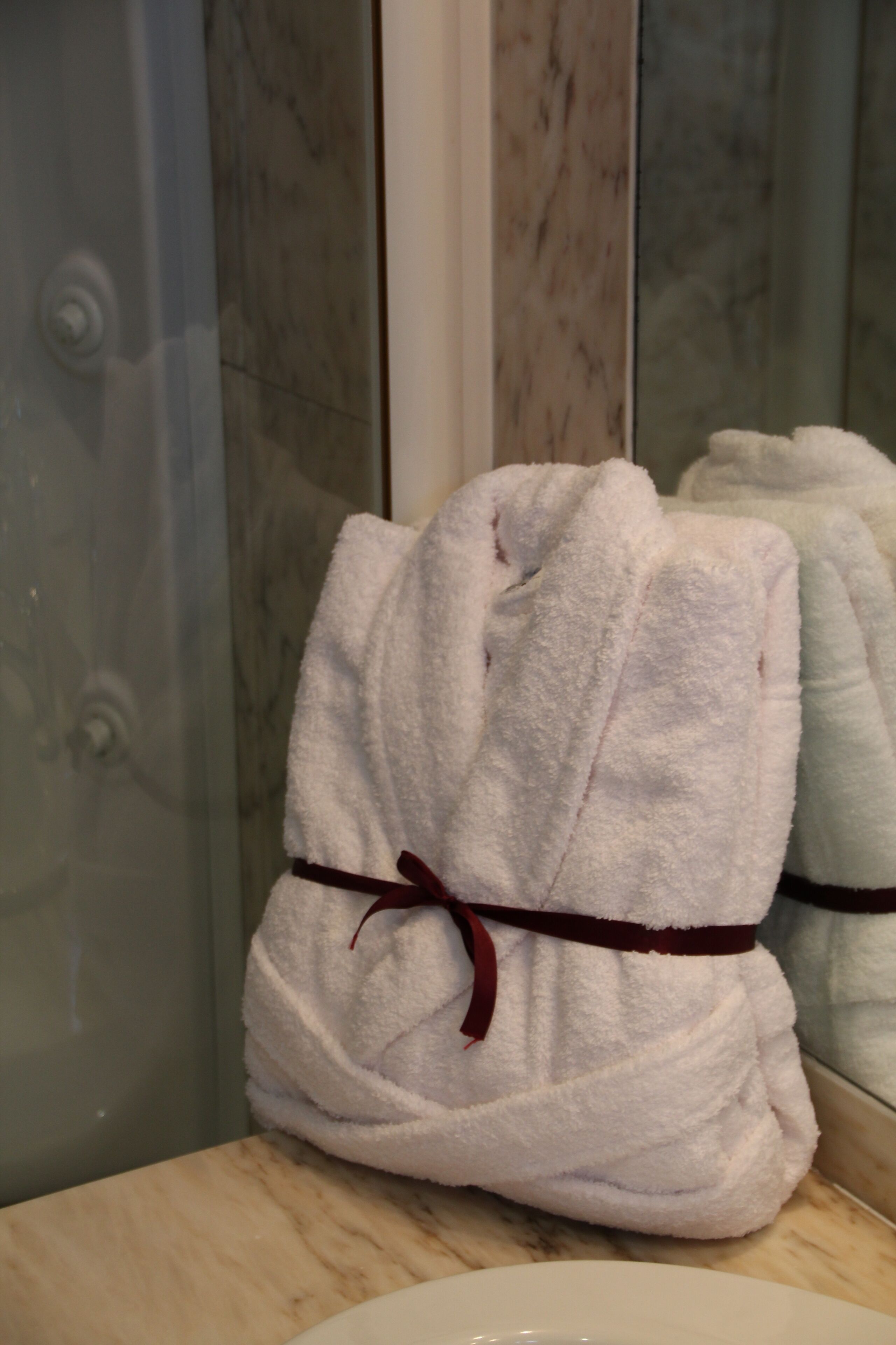 junior suite | bathroom | hair dryer, bidet, towels