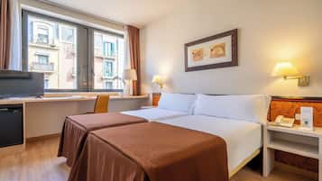 Superior Double Room, Street View | Minibar, in-room safe, desk, laptop workspace