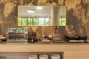 Daily buffet breakfast (EUR 18 per person)