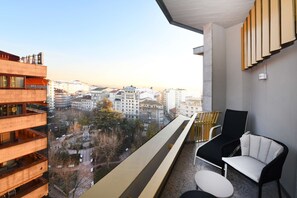 Luxe beddengoed, een minibar, een kluis op de kamer, een bureau