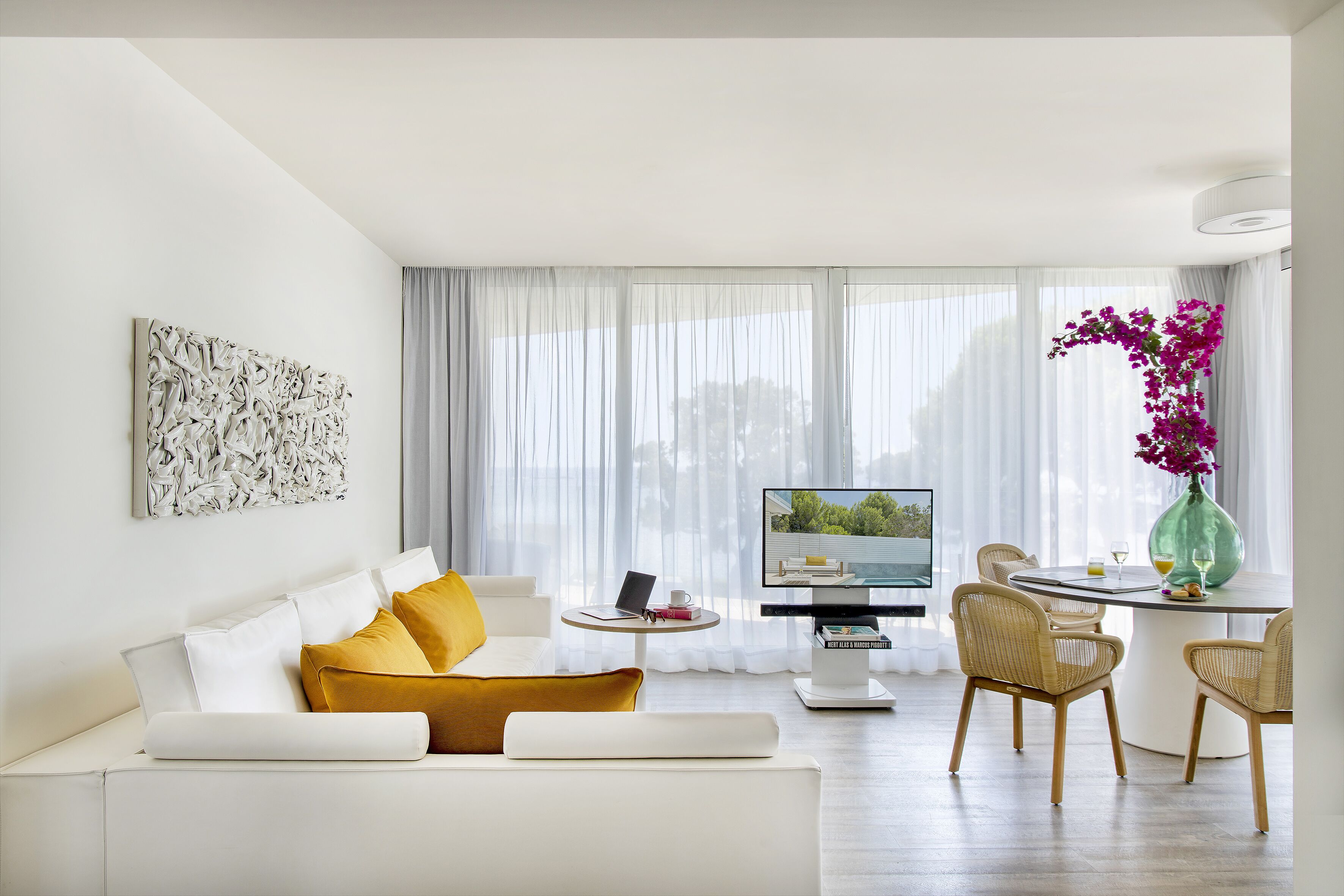 beyond me+ suite with sea view | living room | 32-inch lcd tv with satellite channels, tv, ipod dock