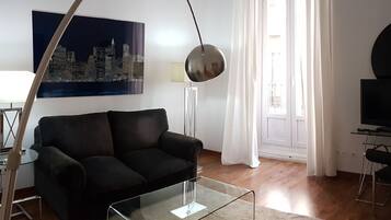 Suite Familiale | Salle de séjour | Télévisions à écran plasma