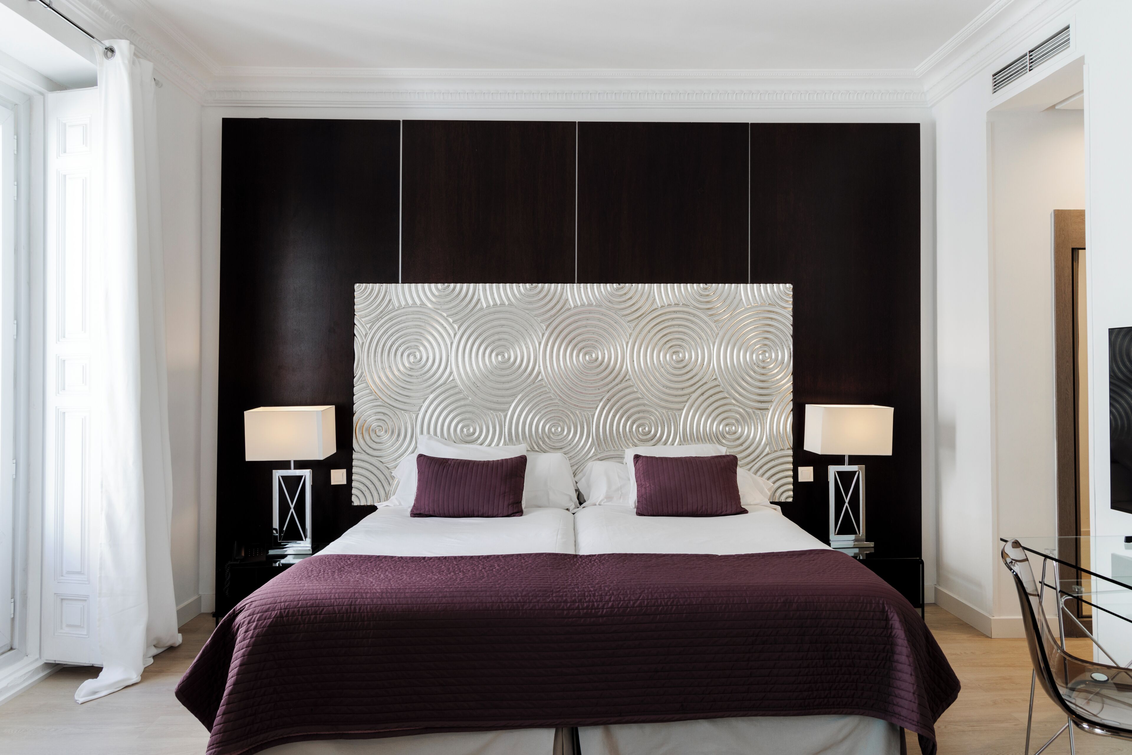 Down comforters, minibar, in-room safe, individually decorated