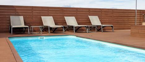 Seasonal outdoor pool, sun loungers