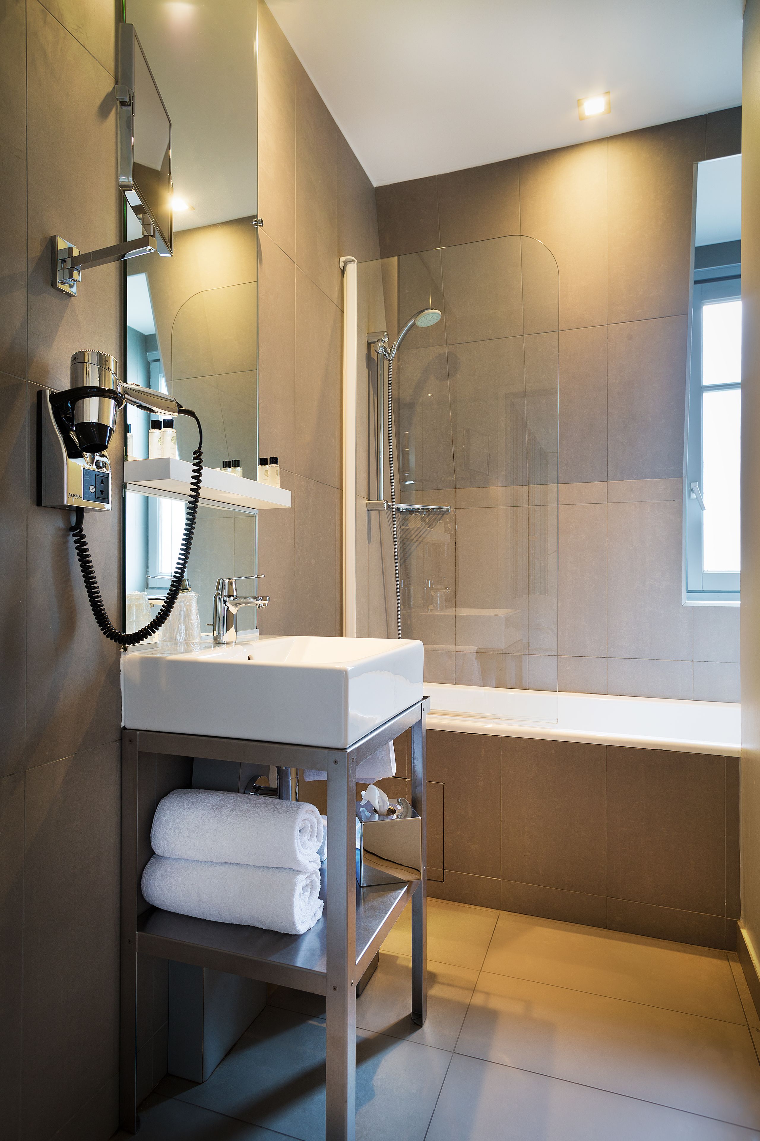 hair dryer, towels, soap, shampoo