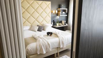 Suite, 1 cama de matrimonio grande, no fumadores | Caja fuerte, mobiliario individual, escritorio