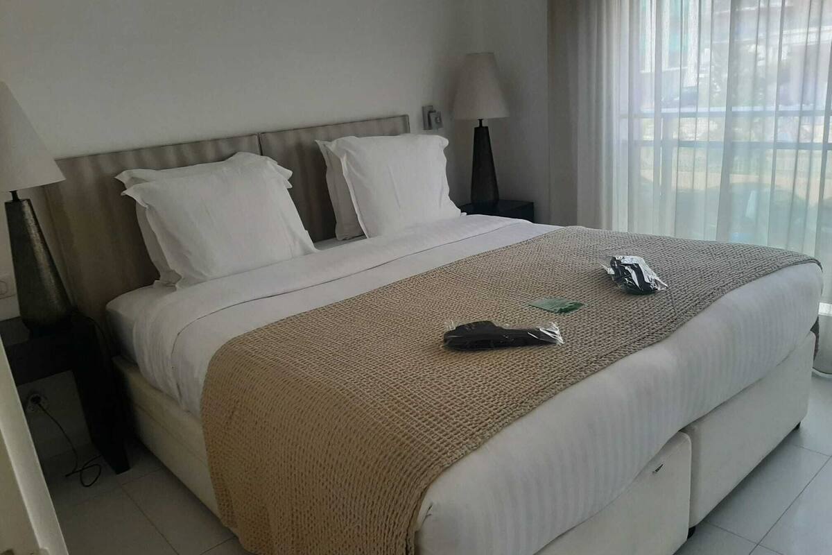 Premium bedding, pillowtop beds, minibar, in-room safe