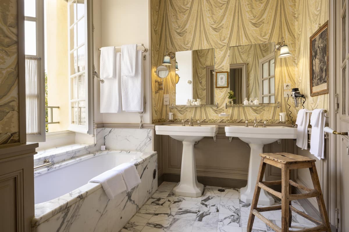 suite, 1 king bed | bathroom | free toiletries, hair dryer, bathrobes, slippers