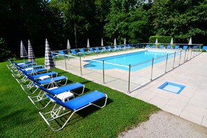 Outdoor pool, pool umbrellas, pool loungers