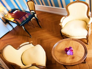 Deluxe Double Room | Living area | Flat-screen TV