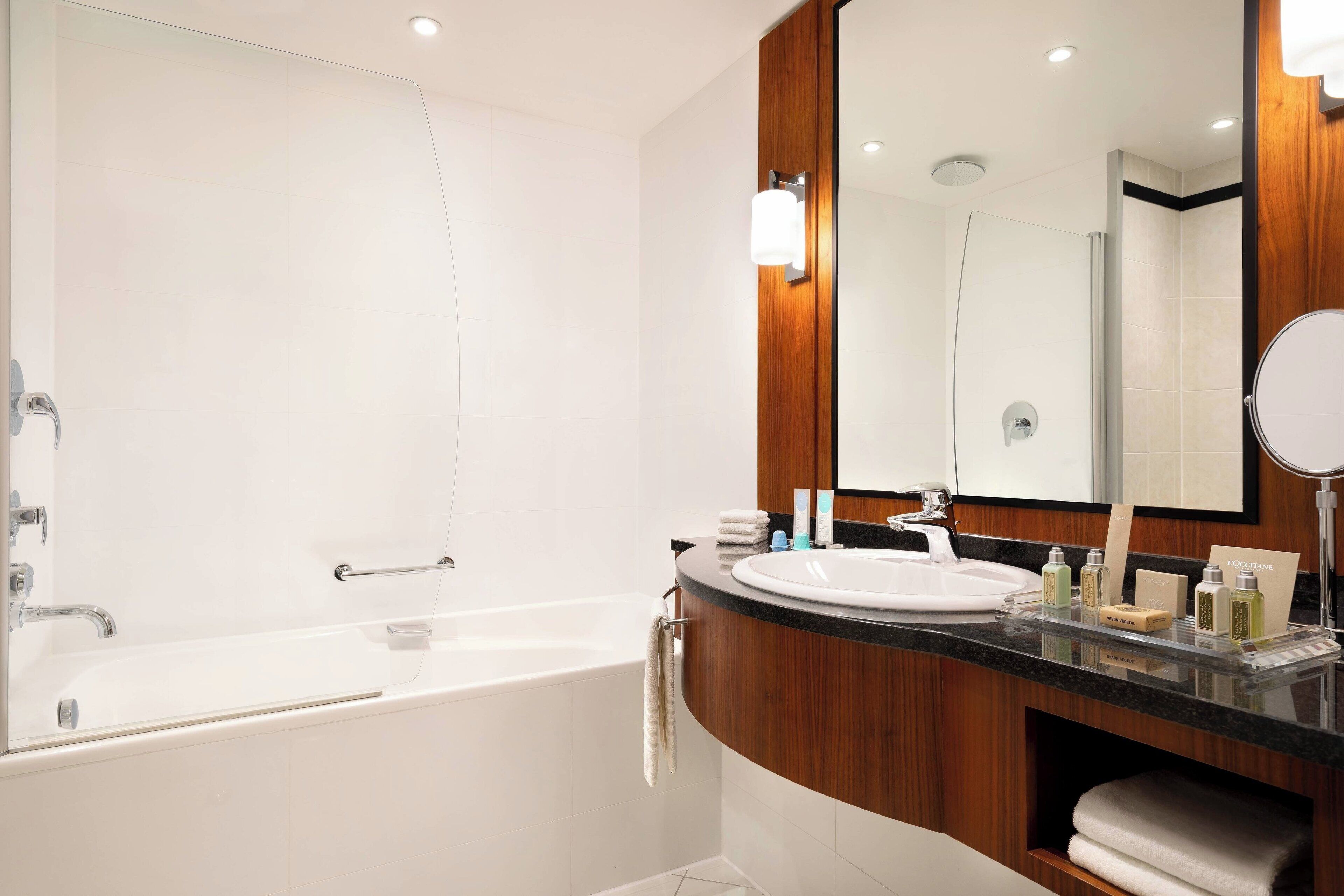 eco-friendly toiletries, hair dryer, towels